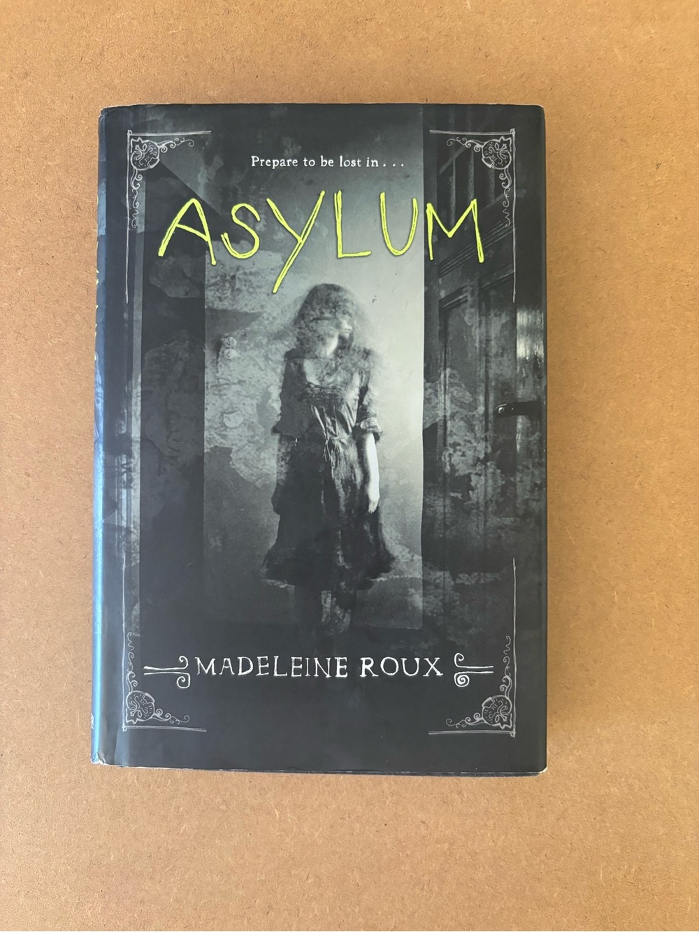 Asylum by Madeleine Roux - Black & Yellow Hardcover